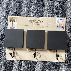 Adorable chalkboard hooks. Sheffield Home brand.